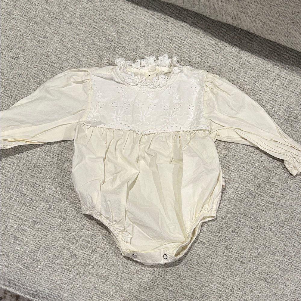 Elegant Cream Baby Romper